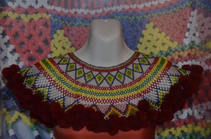 This bead collar, known as Marek Empang, is worn together with the traditional attire of the Iban